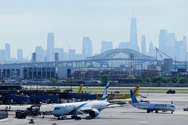 The New York City skyline is seen behind Newark Liberty International Airport in Newark, N.J., Wednesday, May 7, 2025.