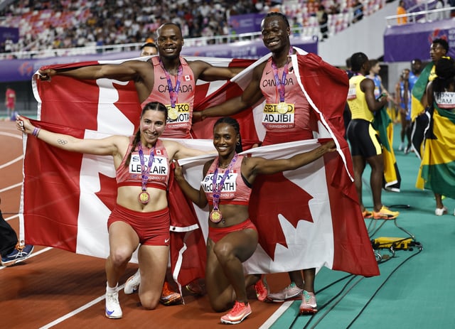 Athletics - World Athletics Relays 2025 - Guangdong Olympic Stadium, Guangzhou, China - May 11, 2025 Canada's Sade McCreath, Marie-Eloise Leclair, Duan Asemota and Eliezer Adjibi celebrate after winning the mixed 4x100 metres relay final REUTERS/Tingshu Wang