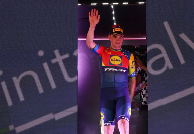 Cycling - Giro d'Italia - Stage 2 - Tirana to Tirana - Albania - May 10, 2025 Lidl - Trek's Mads Pedersen celebrates on the podium after stage 2 REUTERS/Florion Goga