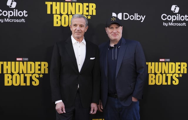 Bob Iger, left, CEO of the Walt Disney Company, and Kevin Feige, president of Marvel Studios, pose together at the premiere of the film "Thunderbolts" at the Dolby Theatre, Monday, April 28, 2025, in Los Angeles. (AP Photo/Chris Pizzello)