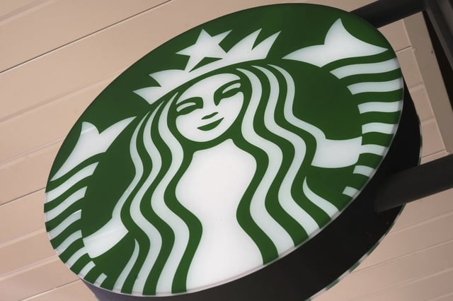 This is a sign in front of a Starbucks in Dormont, Pa., Tuesday, March 18, 2025. (AP Photo/Gene J. Puskar)