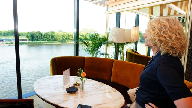 Alyson enjoys the view of the Thames from one of the Riverside Stand’s many luxurious decks