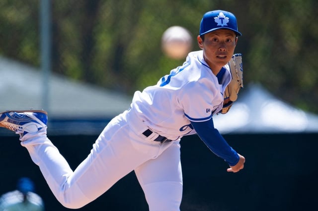 Japanese pitcher Ayami Sato of the Toronto Maple Leafs throws a pitch against the Kitchener Panthers in Intercounty Baseball League action at Christie Pits Park in Toronto on Sunday, May 11, 2025. THE CANADIAN PRESS/Arlyn McAdorey