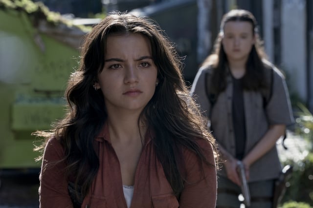 Dina (Isabela Merced) and Ellie (Bella Ramsey) on the streets of Seattle in The Last of Us season 2