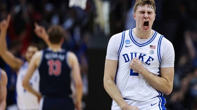 Duke’s Cooper Flagg (2) reacts after scoring a 3-point basket to end the first half against Arizona in the East Regional Sweet Sixteen round of the NCAA Tournament at Prudential Center on March 27, 2025, in Newark, New Jersey. (Patrick Smith/Getty Images/TNS)