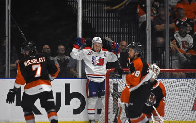 NEWS PHOTO JAMES TUBB Spokane Chiefs captain Berkly Catton celebrates his first period goal, his first of two goals on the night, as Spokane beat the Medicine Hat Tigers 6-2 Sunday at Co-op Place to win Game 2 of the WHL Championship series.