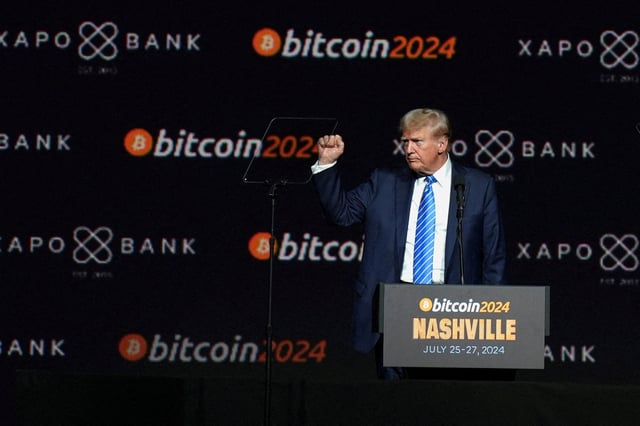 FILE PHOTO: Donald Trump, who was then Republican presidential candidate, gestures at the Bitcoin 2024 event in Nashville, Tennessee, U.S., July 27, 2024. REUTERS/Kevin Wurm/File Photo/File Photo