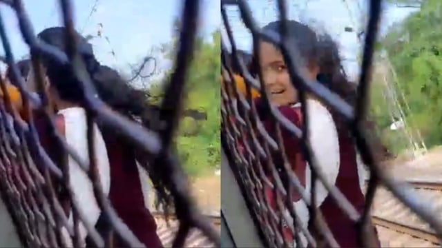 The women travelled outside the moving train.