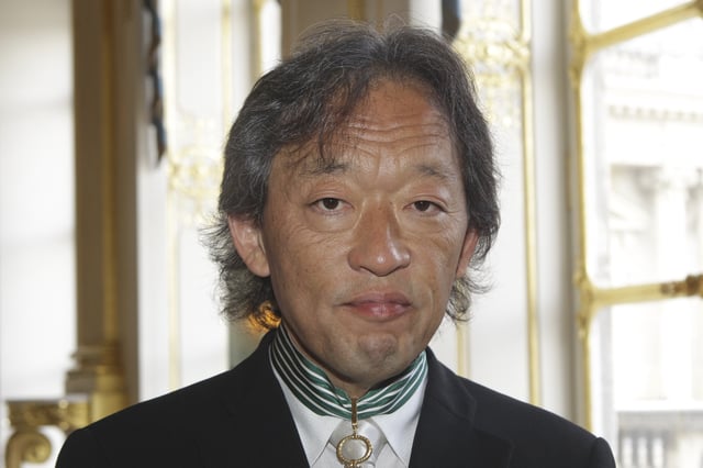 FILE - South Korean conductor and pianist Myung-whun Chung poses for a photographer after being awarded with the Commander of Arts and Letters medal in Paris, on June 29, 2009. (AP Photo/Michel Euler, File)