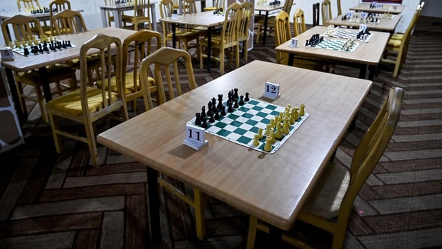 Chessboards are kept in an empty hall with no players at the Kabul Elite Chess Club in Kabul on May 11, 2025. Taliban authorities have barred chess across Afghanistan until further notice over concerns it is a source of gambling, which is illegal under the government's morality law, a sports official said on May 11. (Photo by Wakil KOHSAR / AFP)
