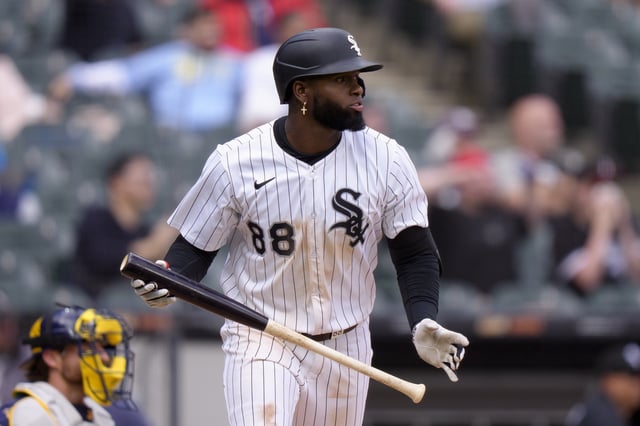 CHICAGO, ILLINOIS - MAY 1: Luis Robert Jr #88 of the Chicago White Sox watches the flight of a ball after hitting a three RBI double in the bottom of the seventh inning in a game against the Milwaukee Brewers at Rate Field on May 1, 2025 in Chicago, Illinois