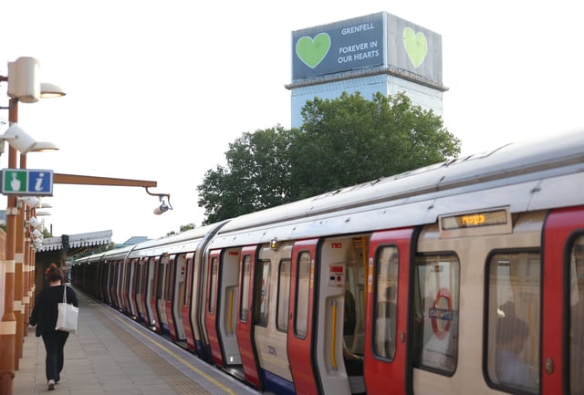 A person walks along a London Underground station platform (Photo: Toby Melville/Reuters)