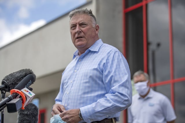 FILE - Georgia Insurance and Safety Fire Commissioner John King makes a statement and answers questions from the media following a tour of Fieldale Farms while visiting Gainesville, Ga., Friday, May 15, 2020. (Alyssa Pointer/Atlanta Journal-Constitution via AP, file)