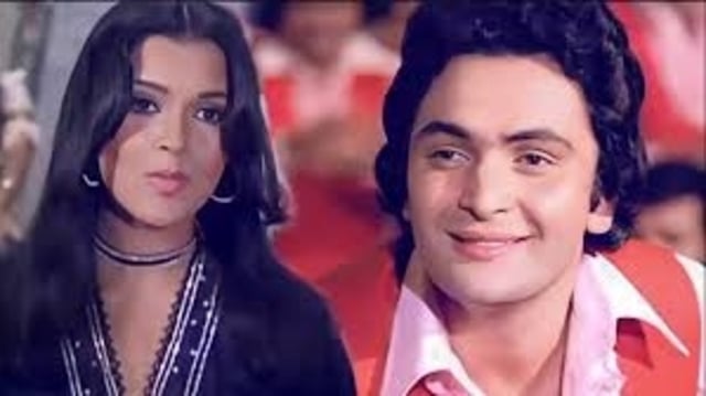 Zeenat Aman and Rishi Kapoor is a still from 1977 film Hum Kisise Kum Naheen.