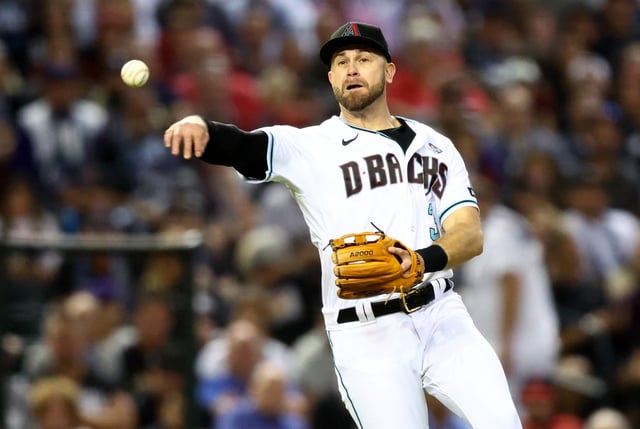 Oct 30, 2023; Phoenix, AZ, USA; Arizona Diamondbacks third baseman Evan Longoria (3) throws to first for an out during the sixth inning in game three of the 2023 World Series against the Texas Rangers at Chase Field. Mandatory Credit: Mark J. Rebilas-USA TODAY Sports/File Photo