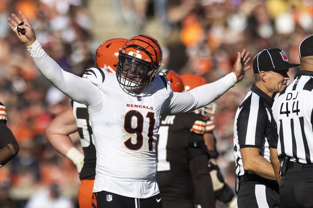 Oct 20, 2024; Cleveland, Ohio, USA; Cincinnati Bengals defensive end Trey Hendrickson (91) reacts following penalty flags being thrown during the fourth quarter against the Cleveland Browns at Huntington Bank Field. The penalties were against the Browns. Mandatory Credit: Scott Galvin-Imagn Images/File Photo