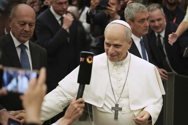 Pope Leo XIV meets members of the international media in the Paul VI Hall at the Vatican, Monday, May 12, 2025. (AP Photo/Andrew Medichini)