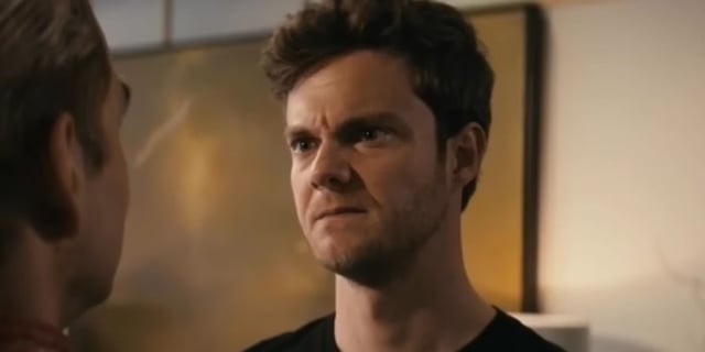 Jack Quaid has a serious expression and talks to someone in The Boys Season 3, Episode 4.