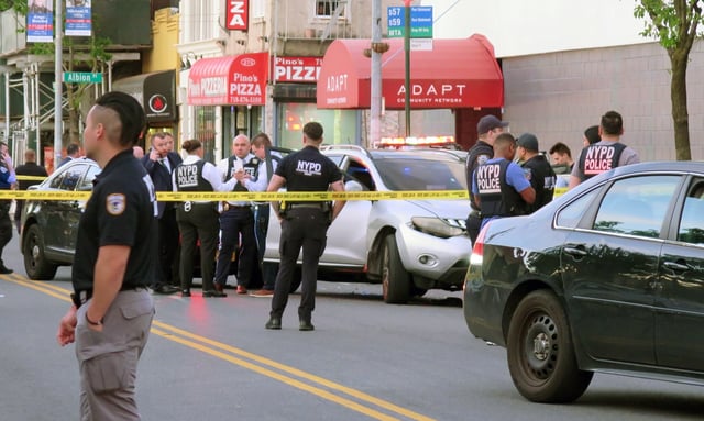 Police on the scene of a shooting on Port Richmond Avenue and Albion Place in Staten Island, New York on Sunday,May 11, 2025. (Rose Abuin/New York Daily News)