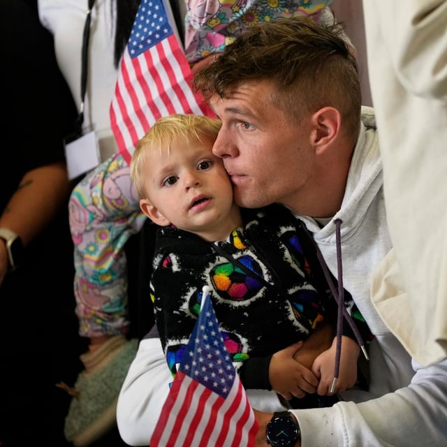 Afrikaner refugees from South Africa arrive, Monday, May 12, 2025, at Dulles International Airport in Dulles, Va. (AP Photo/Julia Demaree Nikhinson)