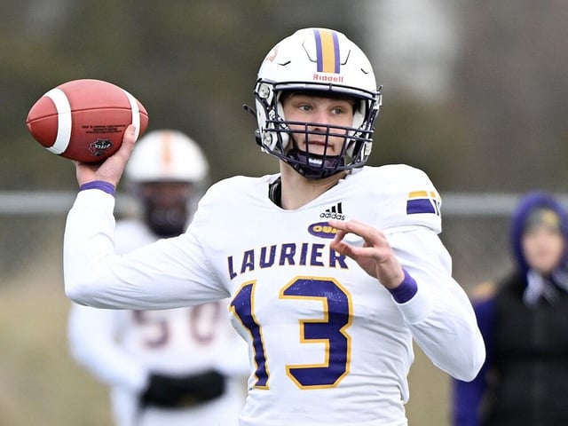Laurier Golden Hawks quarterback Taylor Elgersma throws a pass during first half Uteck Bowl football action against Bishop's Gaiters in Lennoxville, Que., on Saturday, Nov. 16, 2024. (THE CANADIAN PRESS/Graham Hughes)