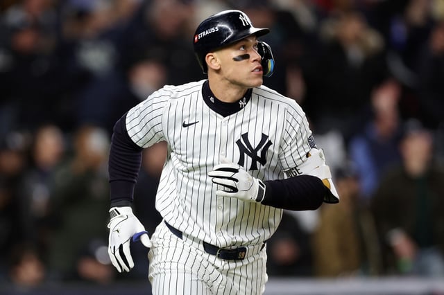 NEW YORK, NEW YORK - OCTOBER 15: Aaron Judge #99 of the New York Yankees rounds the bases after hitting a two-run home run in the seventh inning against the Cleveland Guardians during Game Two of the American League Championship Series at Yankee Stadium on October 15, 2024 in New York City.