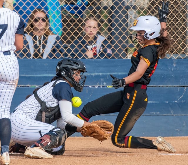 Pacifica catcher Catherine Benitez (11) can’t hang on to the ball and El Modena’s Ava Savala (10) scores during a softball game between El Modena High and Pacifica High in a Crestview League contest at Pacifica High School on March 27, 2025 in Garden Grove, California.
(Photo by Michael Goulding, Contributing Photographer)