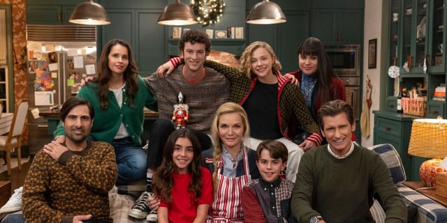 Michelle Pfieffer surrounded by the ensemble cast of Oh. What. Fun.
