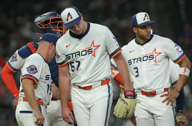 Houston Astros starting pitcher Ryan Gusto (67) is pulled from the game in the third inning after loading the bases with a walk against the Kansas City Royals at Daikin Park in Houston on Monday, May 12, 2025.