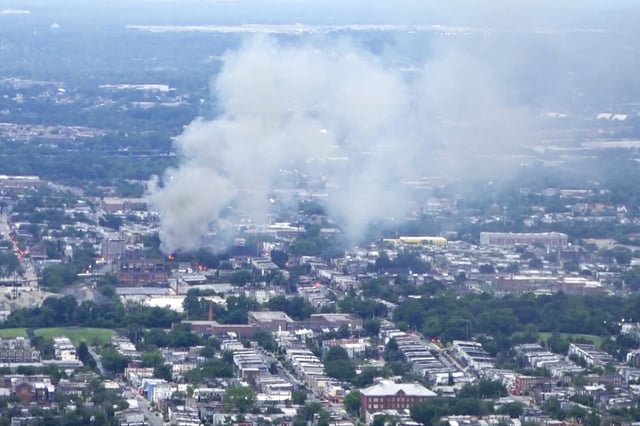 Smoke rises from a warehouse fire in Baltimore on Monday.