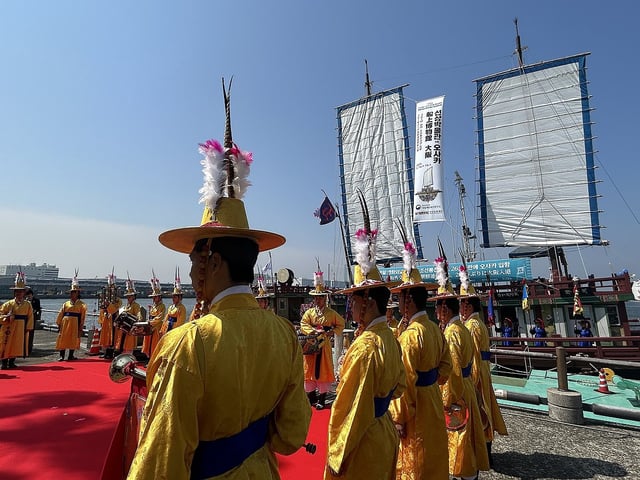 A traditional Korean instrumental band performs during a ceremony at the Port of Osaka in Japan on May 13, 2025, to mark the entry of a replica ship of the past Joseon Tongsinsa diplomatic mission from Korea. (Yonhap)