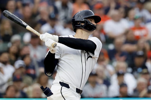 May 12, 2025; Detroit, Michigan, USA;  Detroit Tigers shortstop Trey Sweeney (27) hits a three run home run third inning against the Boston Red Sox at Comerica Park. Mandatory Credit: Rick Osentoski-Imagn Images