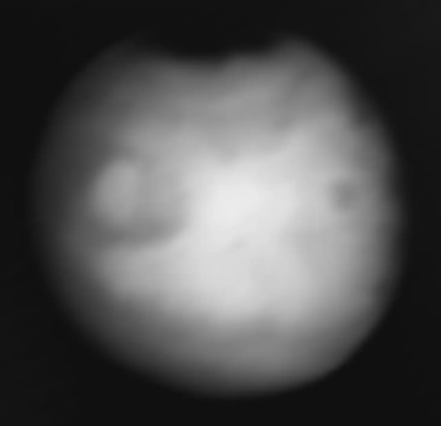This picture of Mars is a composite of several images captured by Europa Clipper’s thermal imager on March 1. Bright regions are relatively warm, with temperatures of about 32 degrees Fahrenheit (0 degrees Celsius). Darker areas are colder. The darkest region at the top is the northern polar cap and is about minus 190 F (minus 125 C). NASA/JPL-Caltech/ASU