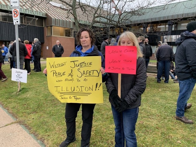 Protesters gather outside P.E.I. Supreme Court in Charlottetown on Nov. 22 where a man who pleaded guilty to manslaughter in the death of Tyson MacDonald appeared for sentencing.