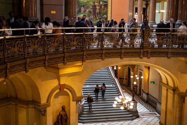 People walk the halls on Feb. 19, 2025, at the state Capitol in Springfield. (Brian Cassella/Chicago Tribune)