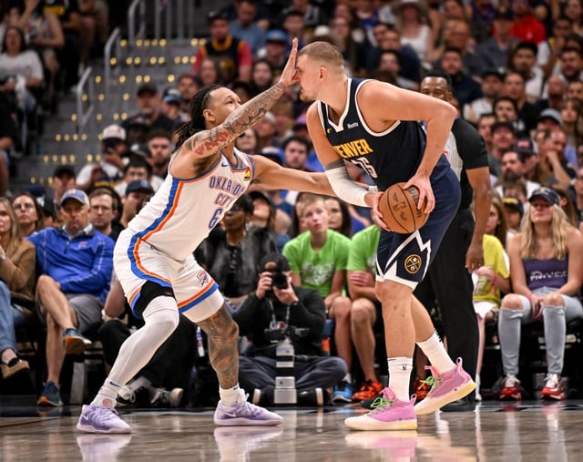 Jaylin Williams (6) of the Oklahoma City Thunder defends Nikola Jokic (15) of the Denver Nuggets during the second quarter at Ball Arena in Denver on Sunday, May 11, 2025. (Photo by AAron Ontiveroz/The Denver Post)