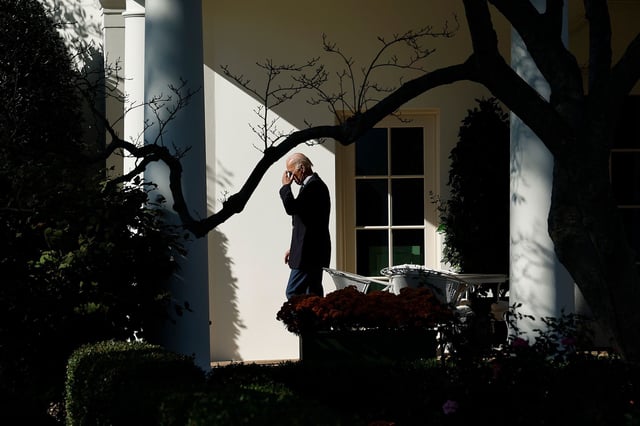 In this November 2023 photo, President Joe Biden walks along the Rose Garden colonnade before boarding Marine One and departing the White House Washington, DC.