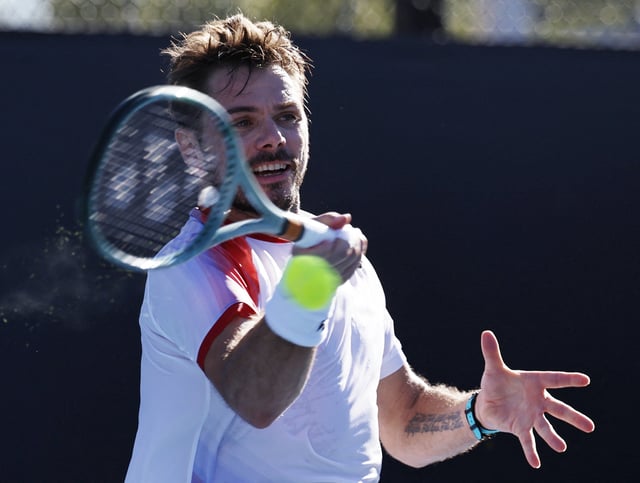 Tennis - Australian Open - Melbourne Park, Melbourne, Australia - January 14, 2025 Switzerland's Stan Wawrinka in action during his first round match against Italy's Lorenzo Sonego REUTERS/Tingshu Wang