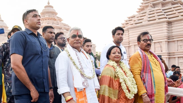 Bharatiya Janata Party (BJP) leader Dilip Ghosh with wife Rinku Majumder and West Bengal Power Minister and TMC leader Aroop Biswas during an event.
