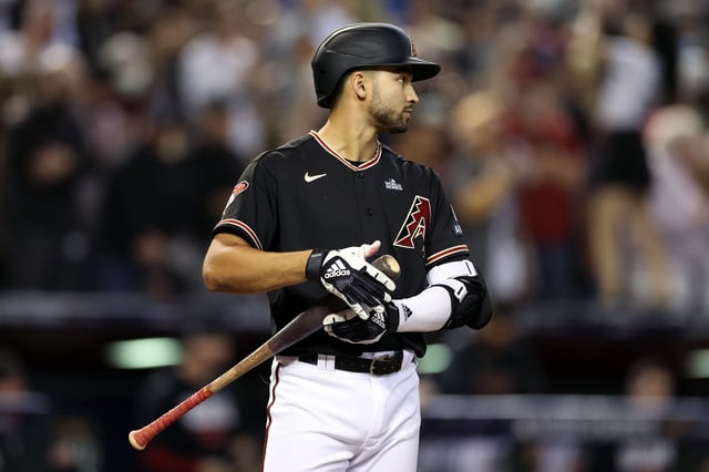 PHOENIX, ARIZONA - OCTOBER 31: Jordan Lawlar #10 of the Arizona Diamondbacks bats in the ninth inning against the Texas Rangers during Game Four of the World Series at Chase Field on October 31, 2023 in Phoenix, Arizona.