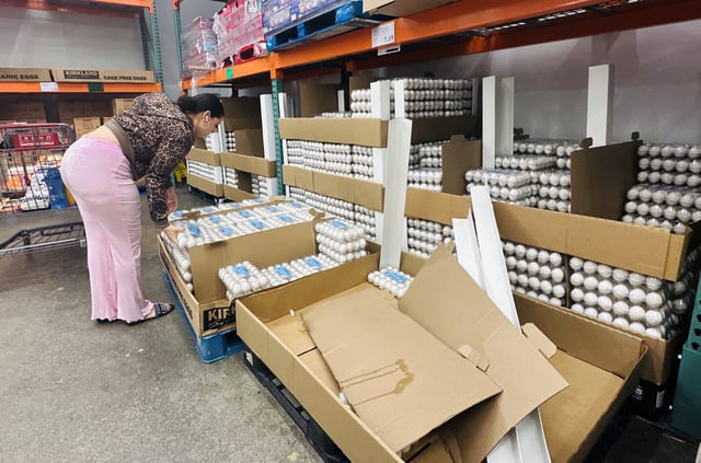A woman shops for eggs at a Costco store on April 28, 2025 in Alhambra, California.