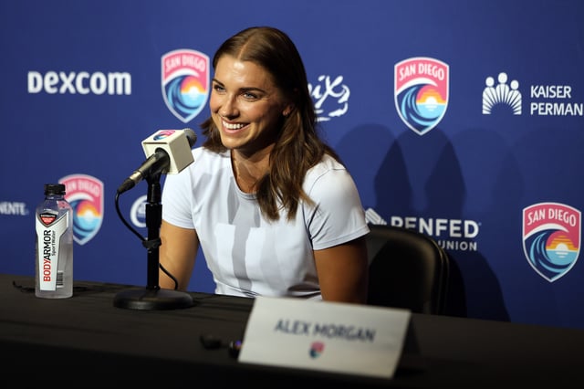 Sep 6, 2024; San Diego, California, USA; San Diego Wave FC forward Alex Morgan (13) speaks during a press conference announcing her retirement at Snapdragon Stadium. Mandatory Credit: Abe Arredondo-Imagn Images