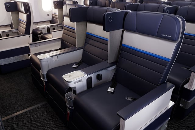 United Premium Plus seats on aircraft with the new Elevated interior have privacy dividers with a built-in reading light.
