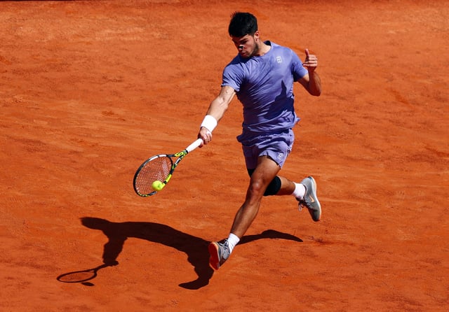 Tennis - Italian Open - Foro Italico, Rome, Italy - May 13, 2025 Spain's Carlos Alcaraz in action during his round of 16 match against Russia's Karen Khachanov REUTERS/Yves Herman     TPX IMAGES OF THE DAY