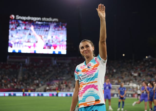 Sep 8, 2024; San Diego, California, USA; San Diego Wave FC forward Alex Morgan (13) waves to fans following her final match before retirement between San Diego Wave FC and the North Carolina Courage at Snapdragon Stadium.  Mandatory Credit: Abe Arredondo-Imagn Images/File Photo