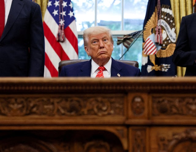 U.S. President Donald Trump makes an announcement about a trade deal with the U.K., in the Oval Office at the White House in Washington, D.C., U.S., May 8, 2025. REUTERS/Leah Millis/File Photo