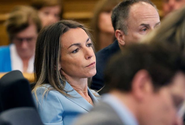 Karen Read listens to the testimony of Jennifer McCabe during her murder trial in Norfolk Superior Court in Dedham, Massachusetts, on Wednesday, April 30, 2025.