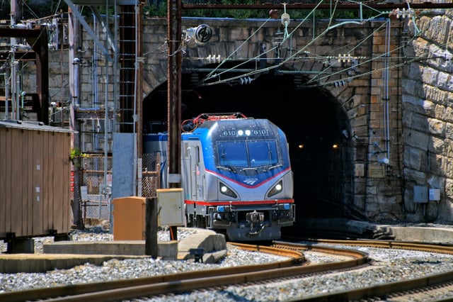 A northbound Amtrak train emerges from the north portal of the  Baltimore &amp; Potomac Tunnel on its way to Baltimore&#39;s Pennsylvania Station. A new tunnel is scheduled to be built and be renamed for Frederick Douglass.