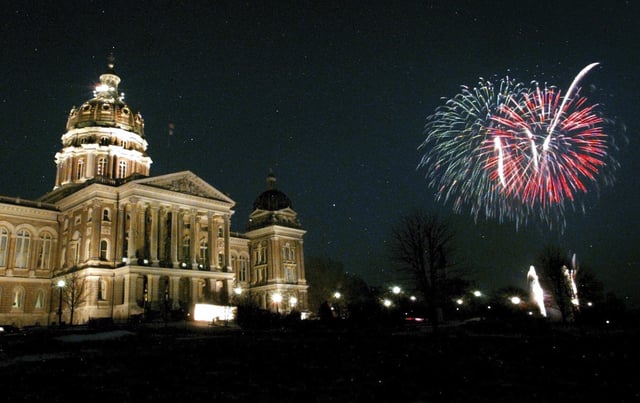 FILE - Fireworks fill the sky near the Iowa Statehouse during Iowa Statehood day, Dec. 28, 1996, in Des Moines, Iowa. (AP Photo/Charlie Neibergall, file)