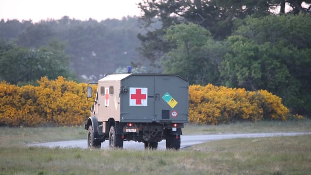A Belgian military ambulance arriving at Kinloss army barracks on Monday